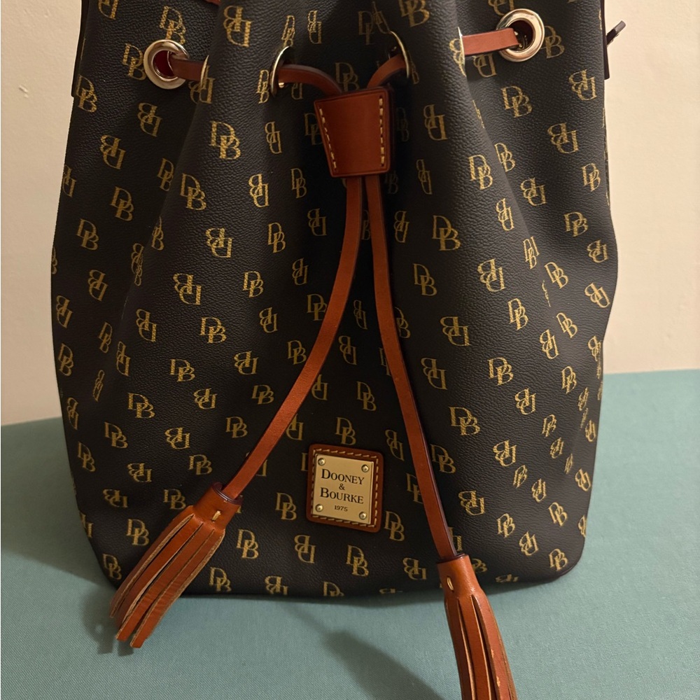 Dooney & Bourke Brown and Black Logo Drawstring Bucket Bag